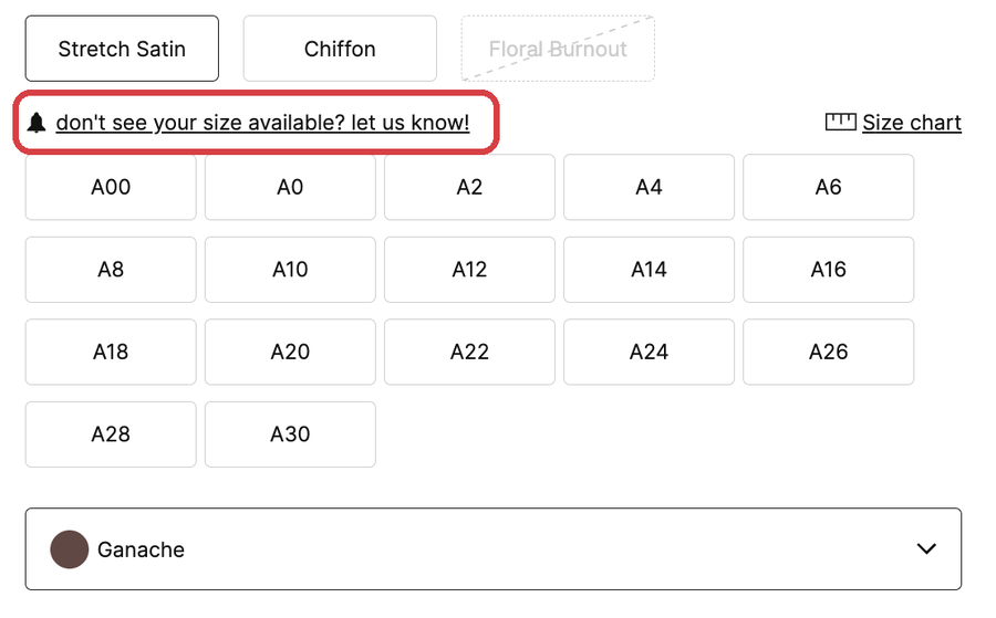Linket til besked med et klokkeikon, over størrelsesknapperne og ved siden af Size chart